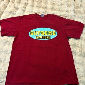 Supreme “New York” Oval Logo Tee – Red/Yellow/Blue – Size Large